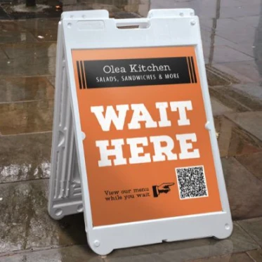 Qr code menus displayed on sandwich board